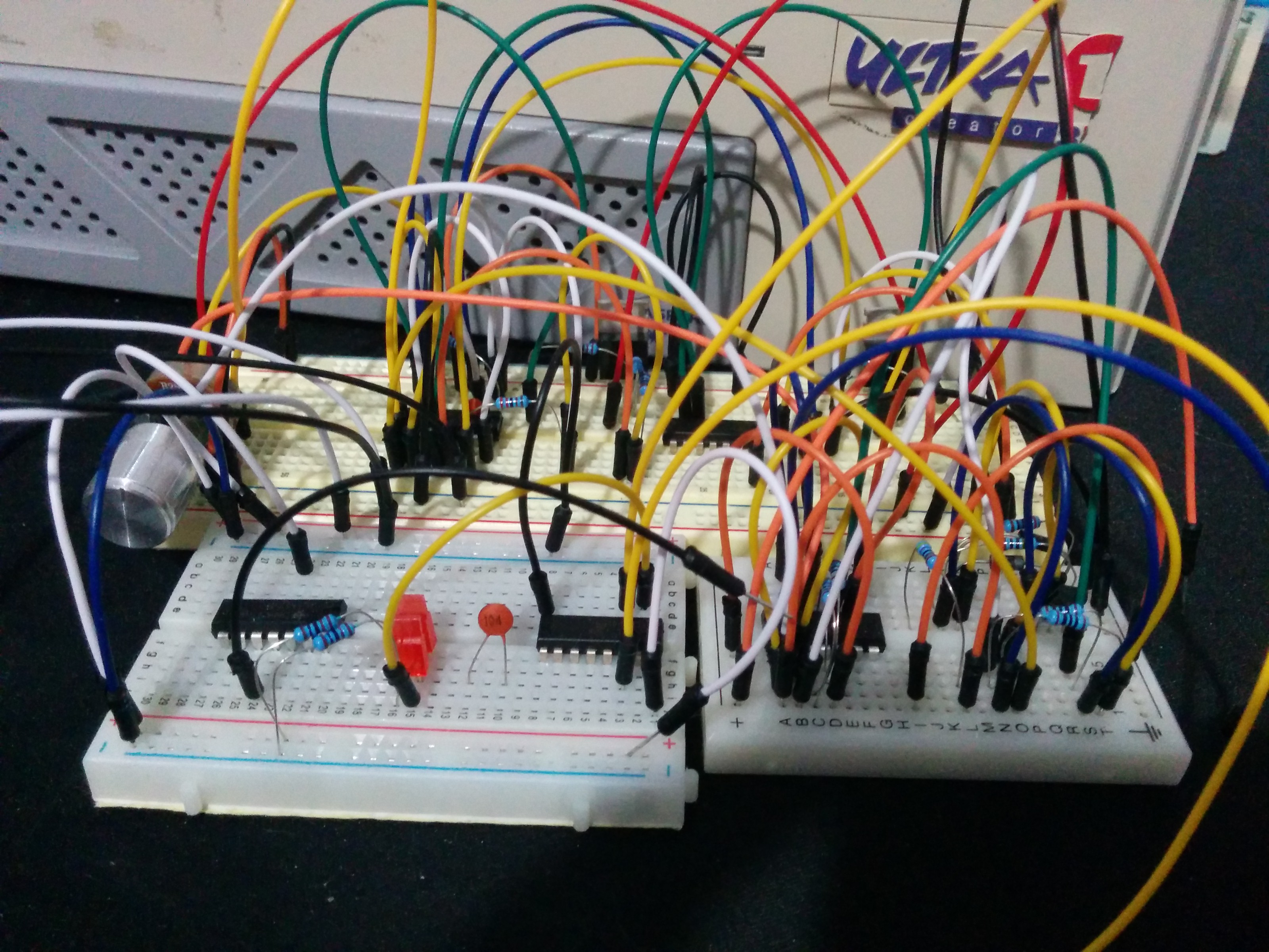 Parts of Synodic Meow on three breadboards